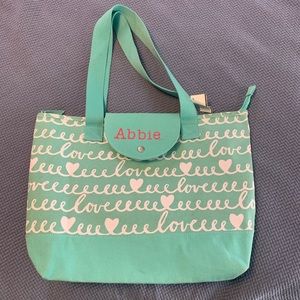 “Abbie” embroidered canvass teal and white bag